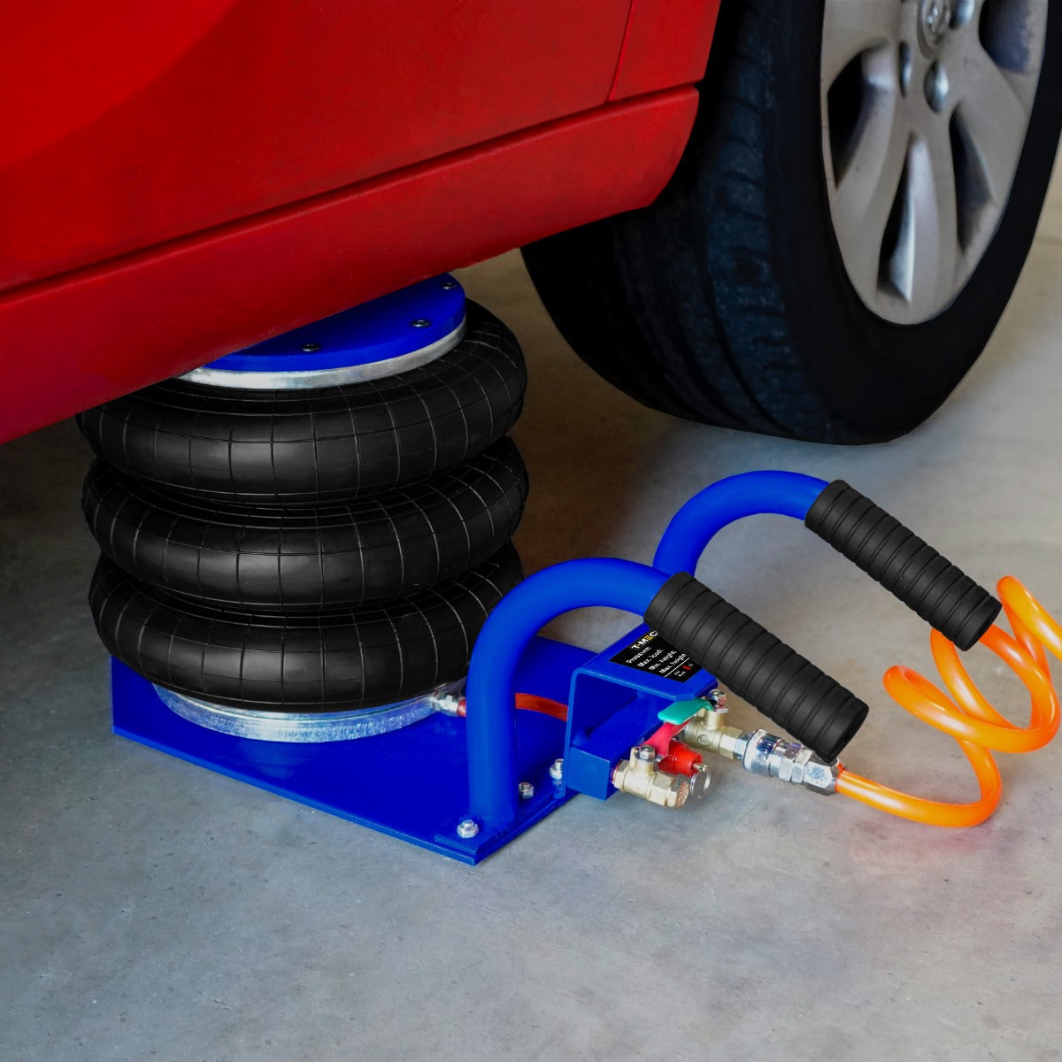 Heavy-duty air bag jack with three black rubber bags, blue handles, and a sturdy base, designed for lifting vehicles safely