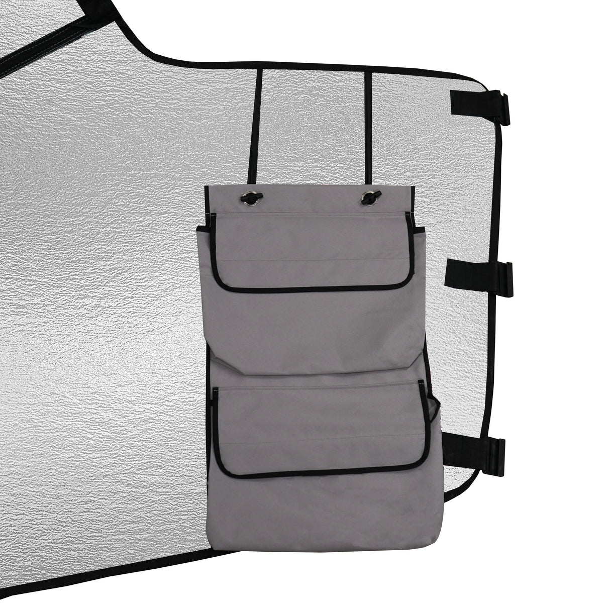 Reflective motorhome screen cover with a gray storage pocket, featuring black trim and adjustable straps for secure fit