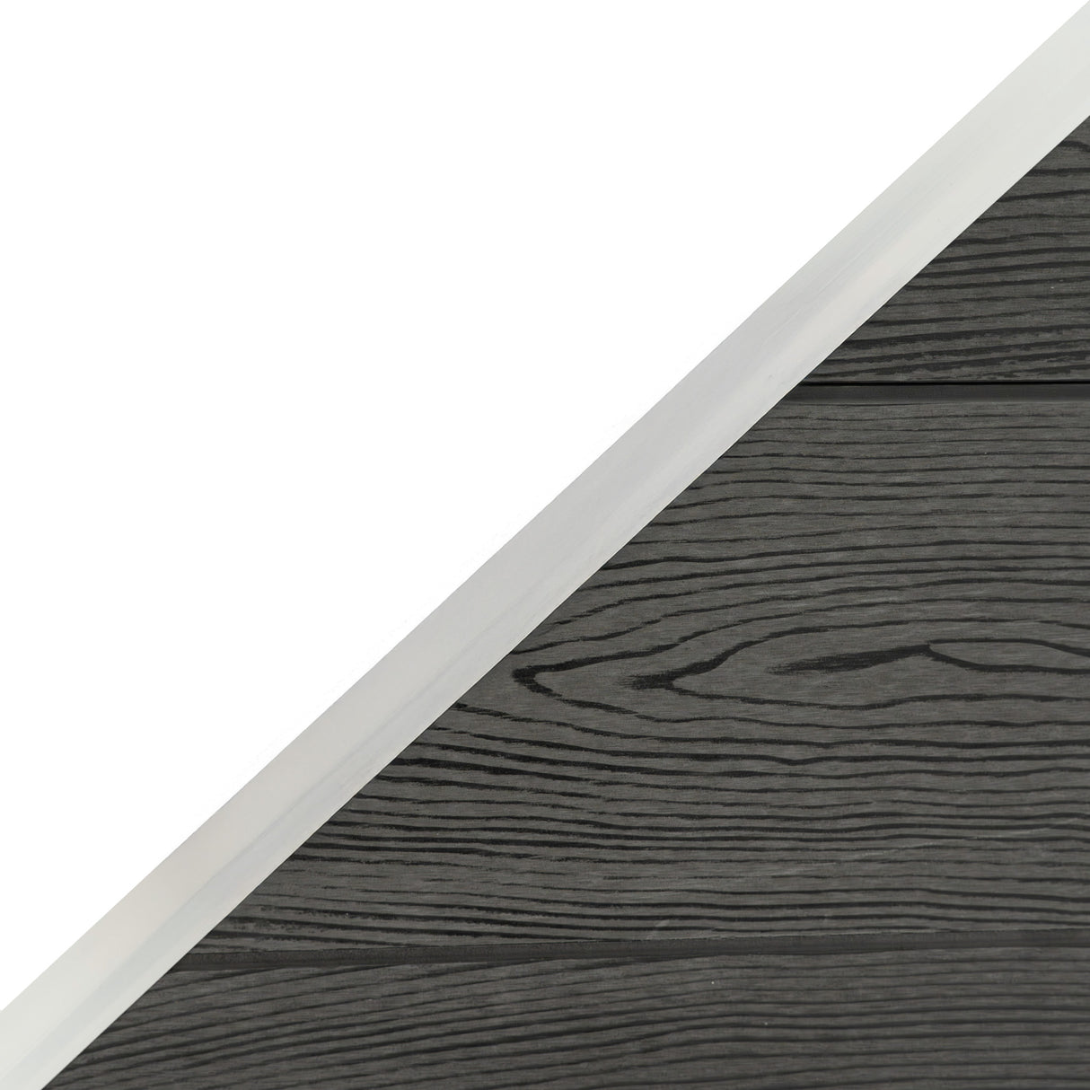 Grey composite angled fence panel featuring a textured wood grain finish and smooth edges, ideal for modern outdoor spaces