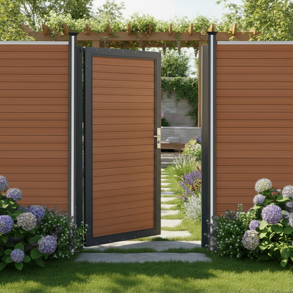Brown composite panel gate with sleek metal frame, surrounded by lush greenery and colorful flowers, leading to a serene garden pathway