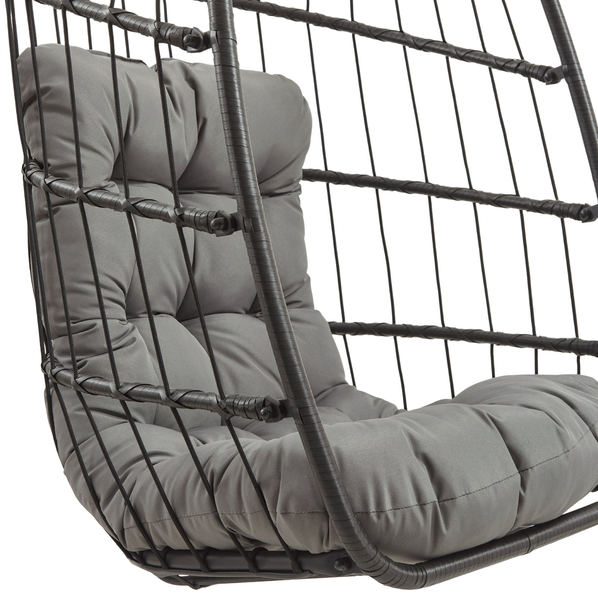 Black rattan hanging egg chair featuring a plush gray cushion, showcasing a modern design with a sleek, woven texture and curved shape