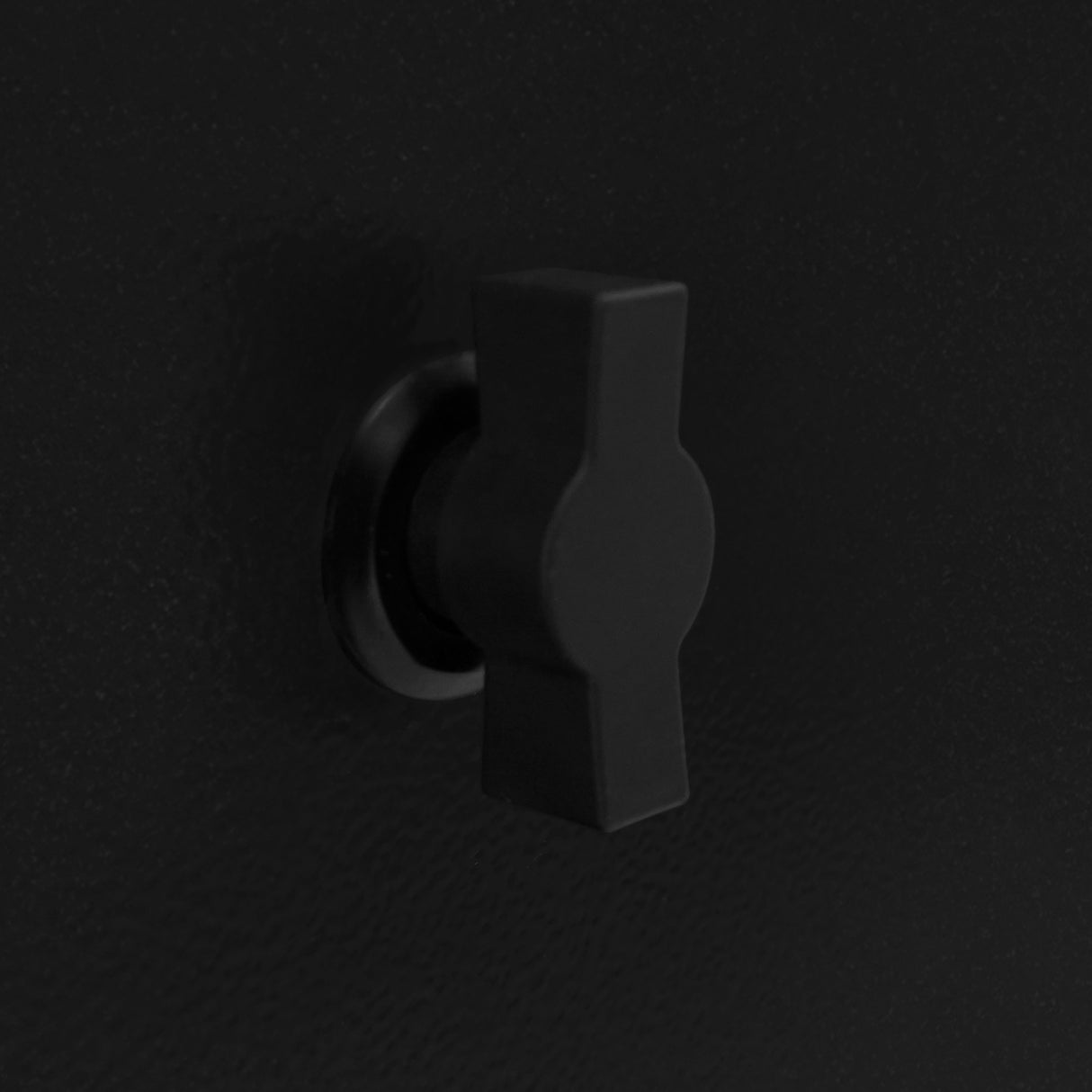 Black gas bottle locker latch with a textured finish, designed for secure closure and easy access to 6kg gas bottles