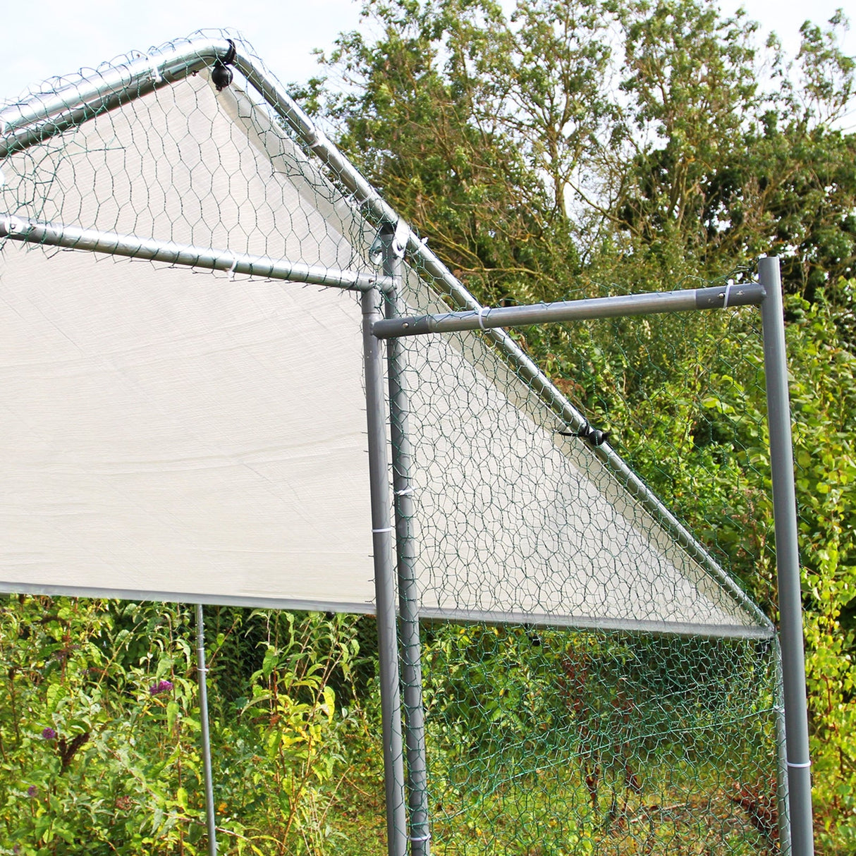 Durable chicken run featuring a 3m x 4m x 2m galvanized steel frame, covered with a weather-resistant tarp and wire mesh for safety