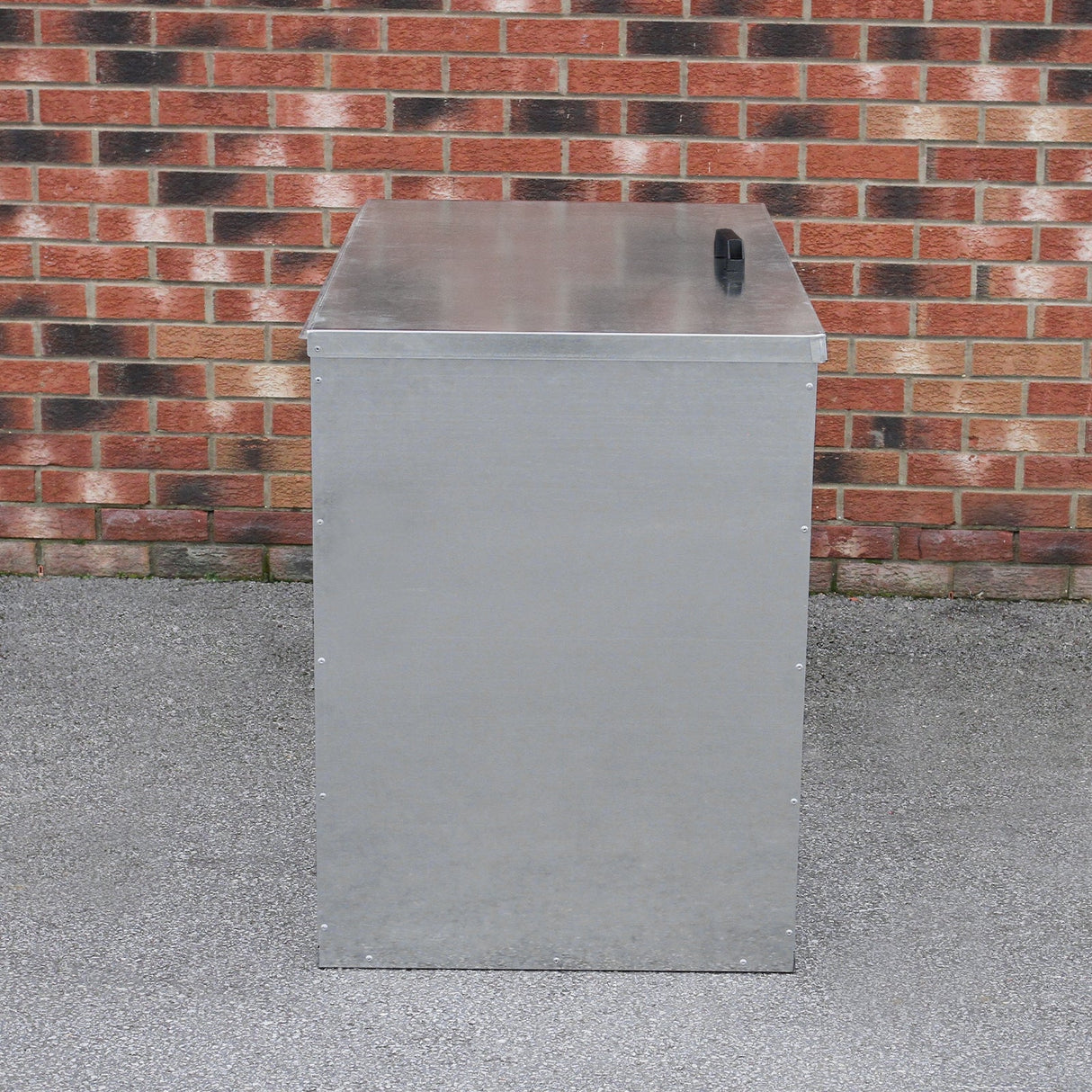 Galvanised metal feed store with three compartments, featuring a smooth silver finish and a sturdy black handle on top
