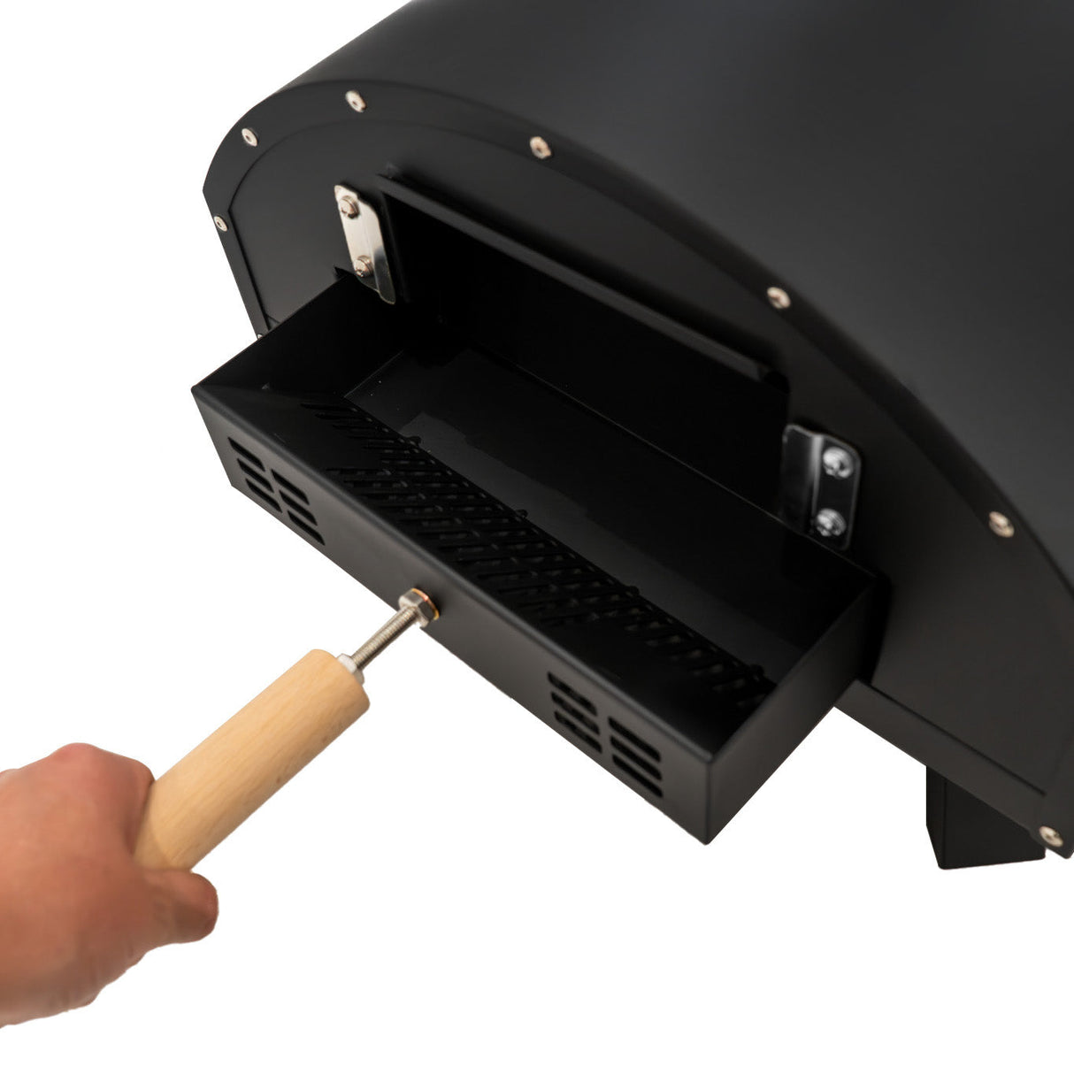 Black outdoor pizza oven with a wooden handle, showcasing a pull-out tray for easy access to the cooking area and ventilation holes