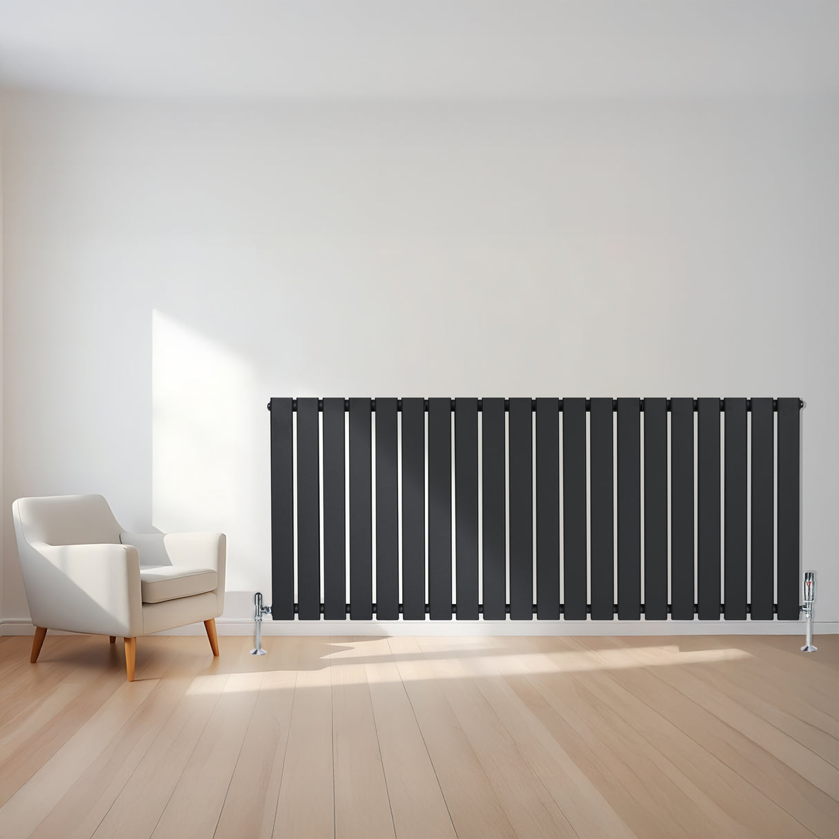 Flat single column radiator in anthracite grey, featuring sleek vertical slats, positioned against a bright wall with a modern chair nearby