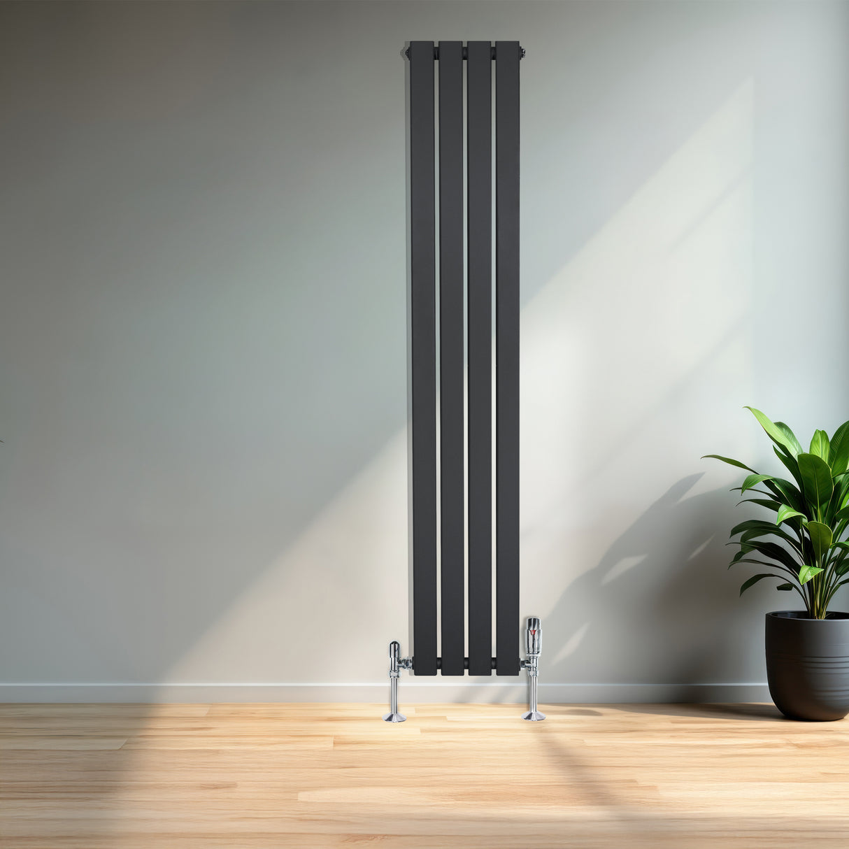 Sleek anthracite grey flat single column radiator with chrome valves, standing tall against a minimalist wall, enhancing modern decor