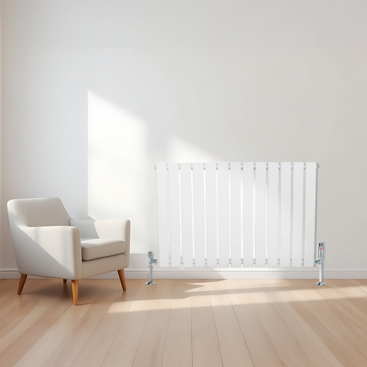 Sleek white flat single column radiator against a light wall, complemented by a modern armchair and warm wooden flooring