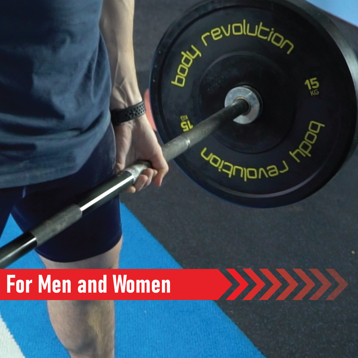 Black Olympic bumper plates with yellow lettering, attached to a barbell held by a person, ideal for weightlifting workouts