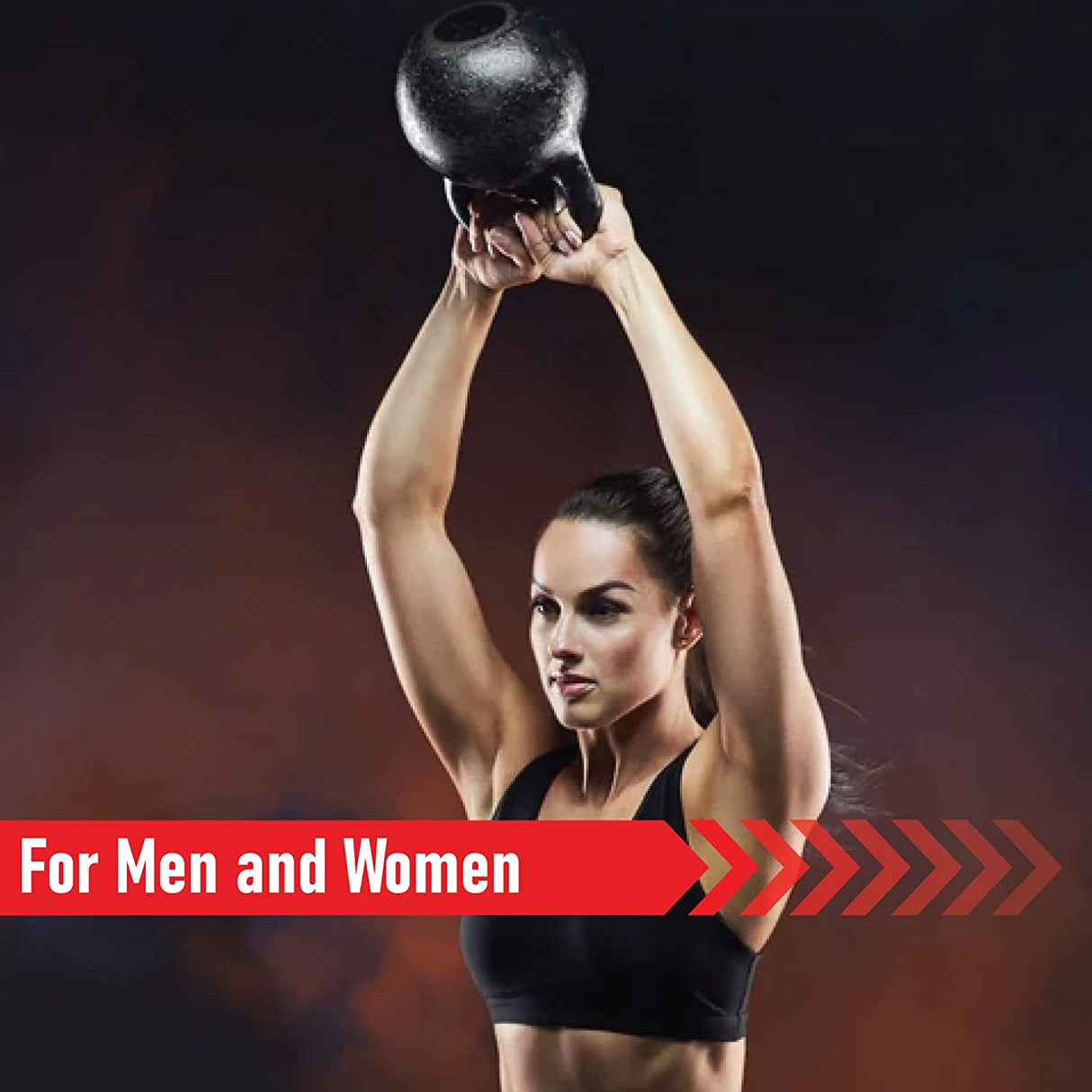 A fit woman lifts a black cast iron kettlebell overhead, showcasing strength and determination against a dark, smoky background