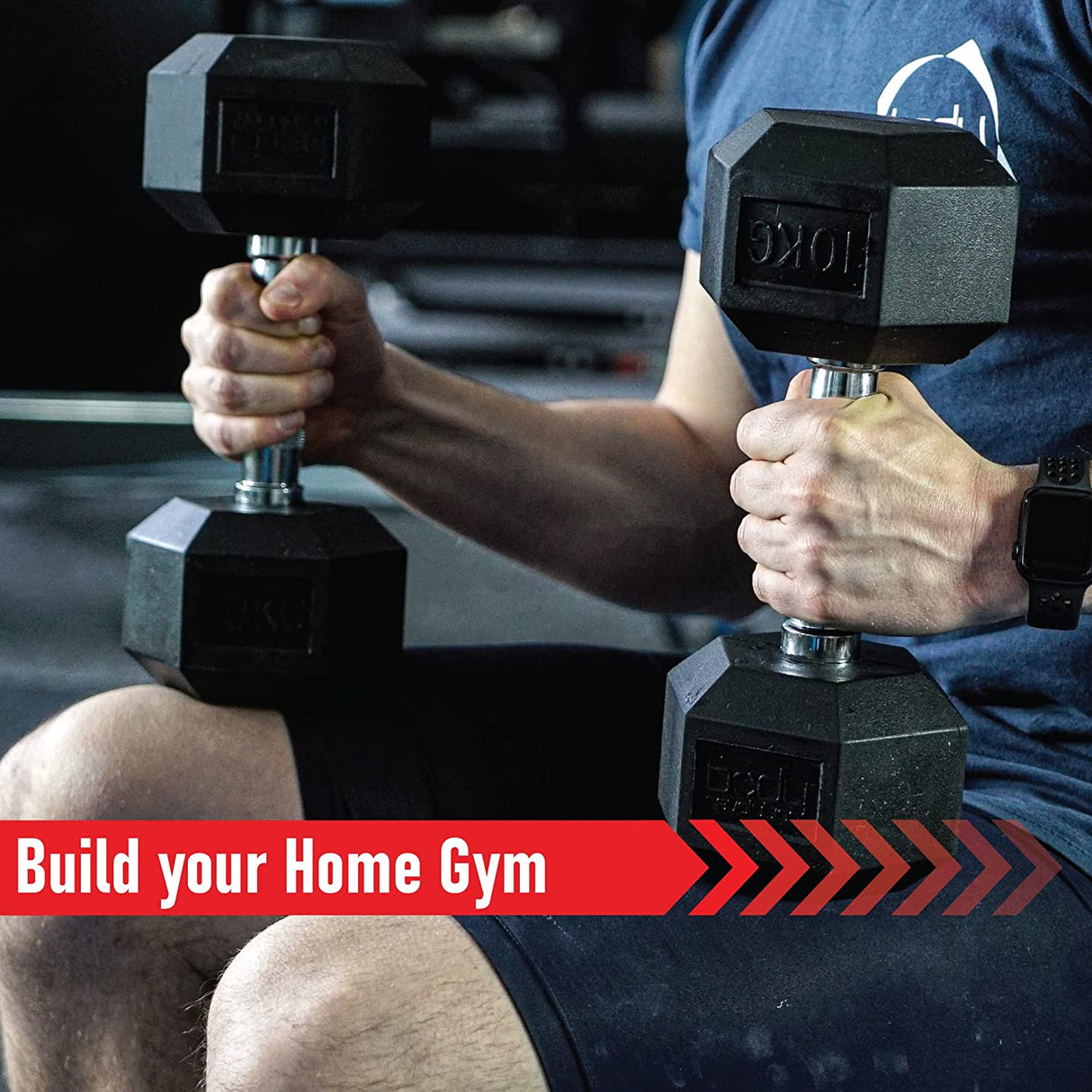Two hexagonal black dumbbells held in a person's hands, showcasing a sturdy grip and textured surface, ideal for home workouts