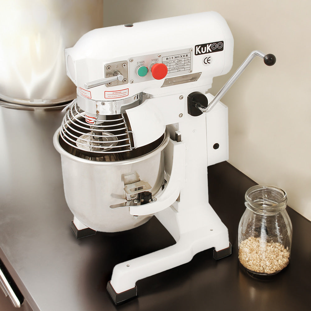 White commercial planetary food mixer with a stainless steel bowl, spiral whisk, and control panel, set on a dark countertop