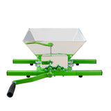 Sturdy green and silver fruit crusher with a large 7-litre capacity, featuring a hand crank and metal frame for easy fruit processing