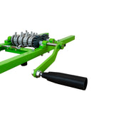 Green 7-litre fruit crusher with a sturdy handle, metal gears, and a robust frame, designed for efficient fruit processing