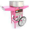 Bright pink KuKoo candy floss machine with stainless steel bowl, mounted on a sturdy cart with large wheels for easy mobility