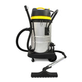 Stainless steel MAXBLAST 60L industrial vacuum cleaner with yellow accents, flexible hose, and sturdy wheels for easy mobility