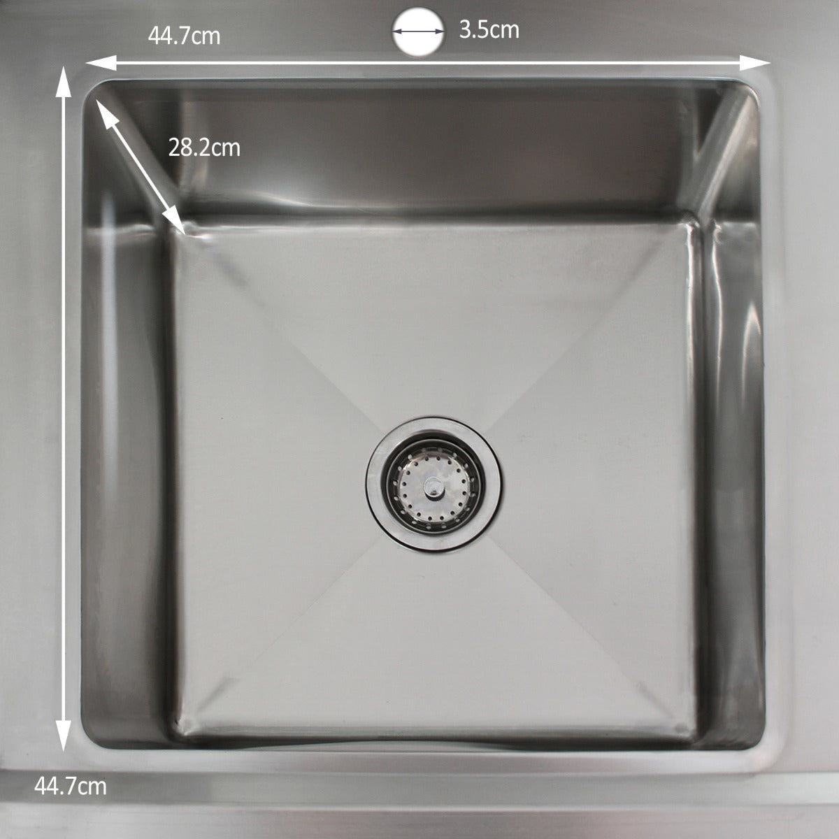 Stainless steel catering sink with a left-hand drainer, featuring a square basin, polished surface, and central drain hole