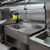 Stainless steel catering sink with a right-hand drainer, featuring a smooth surface, sleek design, and polished finish, ideal for commercial kitchens