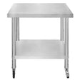 Stainless steel work table with a smooth top, sturdy legs, and a lower shelf, featuring rolling casters for easy mobility