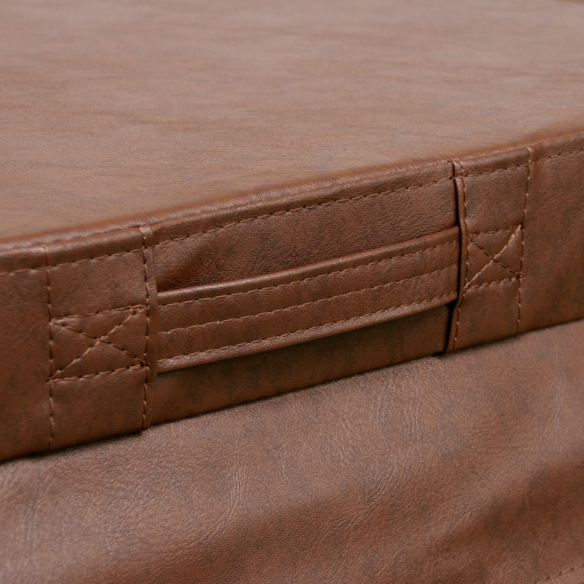 Brown 2m hot tub spa cover featuring a textured surface, sturdy stitching, and convenient side handles for easy lifting