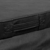 Durable black hot tub spa cover with a smooth texture, featuring reinforced edges and convenient handles for easy removal