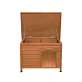 Small wooden dog kennel with a slatted design, featuring a hinged roof for easy access and a cozy entrance for pets