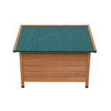 Small wooden dog kennel with a sloped green felt roof, featuring smooth wood panels and a sturdy, weather-resistant design