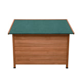 Large wooden dog kennel with a slatted design, featuring a green felt roof for weather protection and a spacious interior