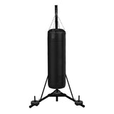 Sturdy black folding punch bag stand with a heavy bag suspended by a chain, featuring a triangular base for stability
