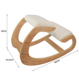 Ergonomic kneeling chair with a curved wooden frame, soft cream cushion, and dimensions of 85cm length, 55cm height, and 54.5cm width