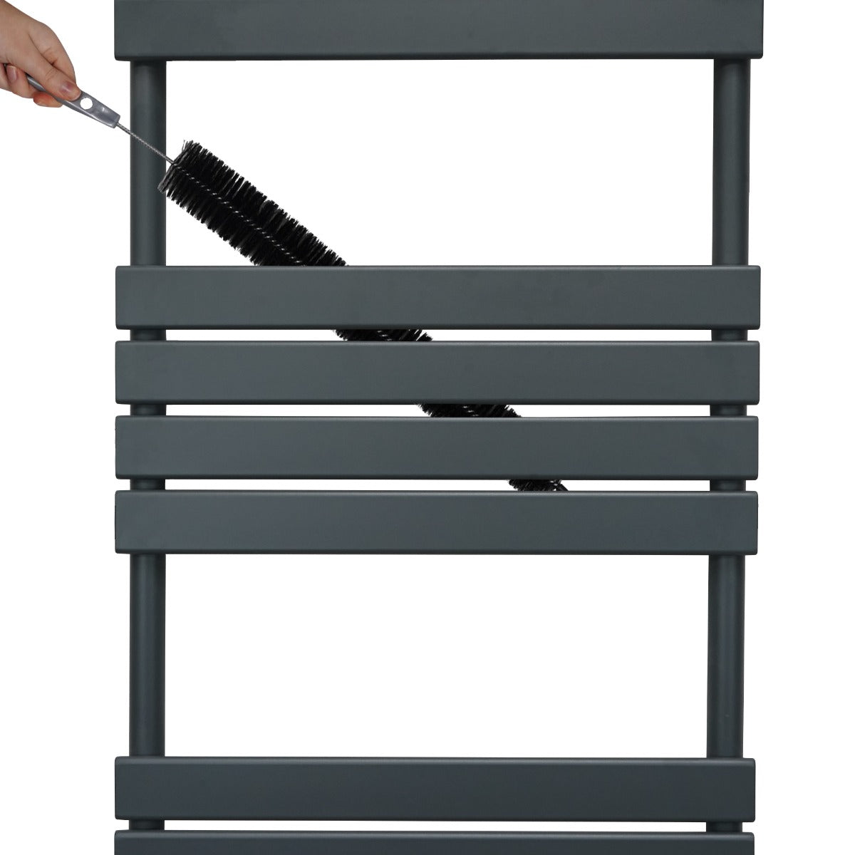 Anthracite grey flat panel towel radiator with sleek horizontal bars, featuring a hand holding a cleaning brush for maintenance