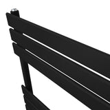 Sleek black flat panel towel radiator with horizontal slats, designed for modern bathrooms, measuring 1200mm x 450mm