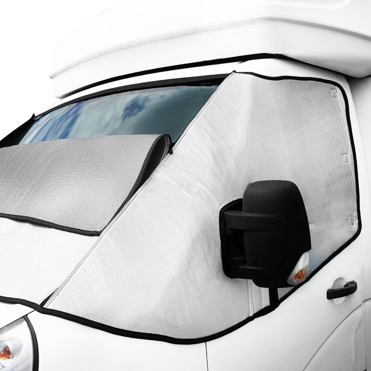 Reflective motorhome screen cover with silver exterior, designed to block sunlight and heat, fits snugly over the windshield and side mirror