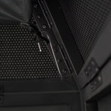 Close-up of the DJ Disco Booth Pro's sleek black metal frame, featuring a textured mesh backdrop and secure locking mechanism