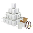 Twenty-four white sublimation mugs stacked in a pyramid, accompanied by a brown box and a roll of heat tape for customization