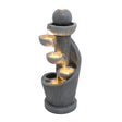 Elegant electric water feature with spiral design, featuring four tiered bowls and a glowing orb, finished in textured gray stone
