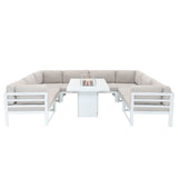 Modular garden furniture set featuring a white frame, soft beige cushions, and a central fire pit for outdoor gatherings