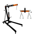 Heavy-duty black engine crane with orange accents, featuring a load leveller and chains for secure lifting of up to 2 tonnes
