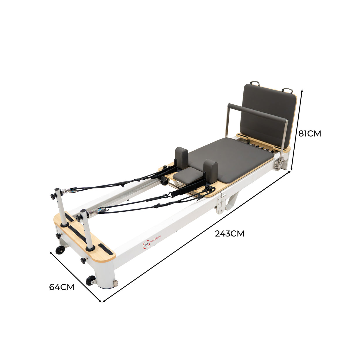 Pilates reformer with a sleek white frame, gray padded surface, and adjustable straps, measuring 243cm by 64cm by 81cm
