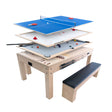 Versatile 7-in-1 games table in oak finish, featuring interchangeable game surfaces for air hockey, ping pong, and more, with two storage benches