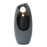 Sleek gray electric water feature with a modern design, featuring a glowing light and textured black stone accents