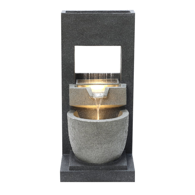Elegant electric water feature with cascading water, featuring a sleek black stone design and smooth, rounded textures