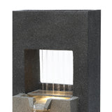 Sleek black stone electric water feature with cascading water, illuminated base, and modern rectangular design for outdoor decor