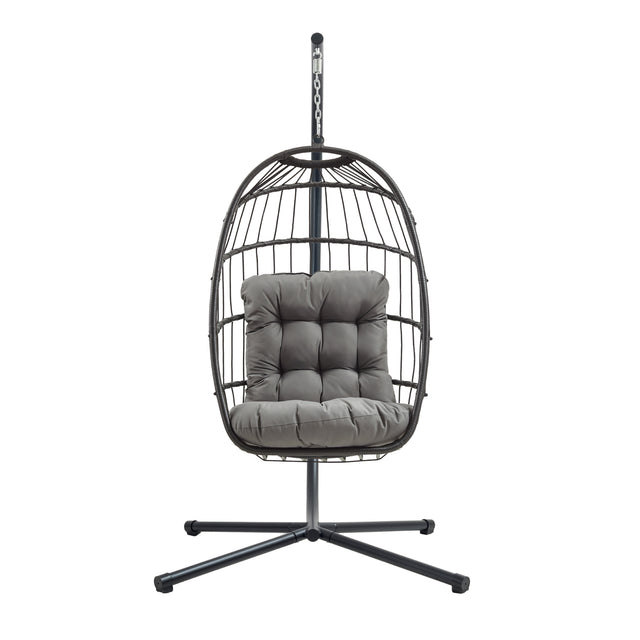 Black rattan hanging egg chair with a plush gray cushion, featuring a sturdy metal stand and a modern, stylish design