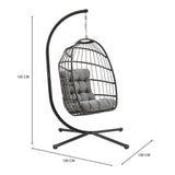 Black rattan hanging egg chair with plush gray cushions, featuring a sleek curved stand and modern design, ideal for outdoor relaxation