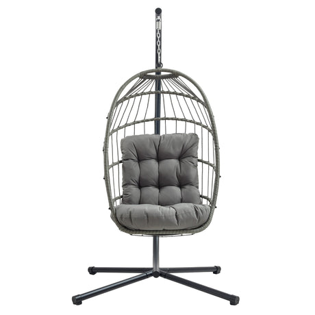 Stylish grey rattan hanging egg chair with plush cushion, featuring a sturdy metal stand and a modern, airy design for relaxation