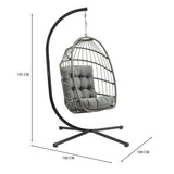 Grey rattan hanging egg chair with plush cushion, suspended from a sleek black metal frame, ideal for indoor or outdoor relaxation
