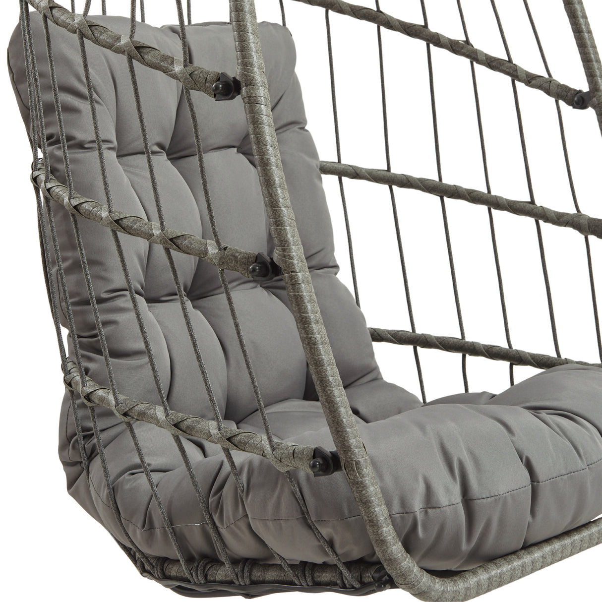 Stylish grey rattan hanging egg chair featuring a plush, tufted cushion and a woven frame, perfect for indoor or outdoor relaxation