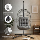 Grey rattan hanging egg chair with a sturdy frame, plush 15cm thick cushion, and protective rain cover, ideal for indoor or outdoor use