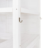 White Victorian greenhouse interior featuring wooden shelves, smooth surfaces, and decorative hooks for hanging plants or tools